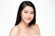© kitthanes  - Beautiful smiling young asian woman with clean skin, natural make-up, on white background,
