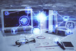 © peshkova - Computer on desktop with social network hologram. Double exposure. Concept of international people connections.