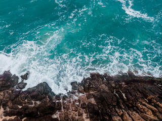 Wall Mural - view from above, rocky coast, turquoise sea.