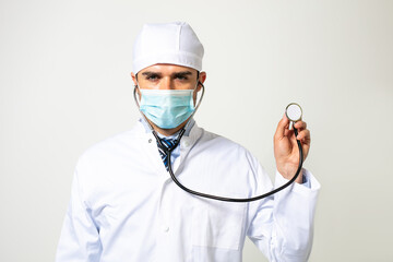 doctor with uniform and mask protection on white