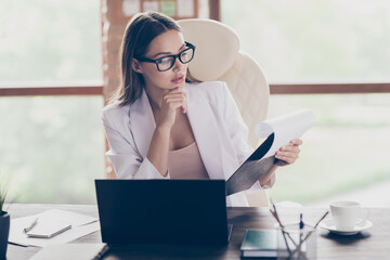 Sticker - Photo of attractive business lady hold clipboard read colleagues partners contract notebook table concentrated data information home office social distance formal wear specs suit indoors