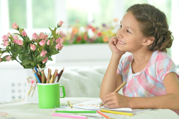 Poster - Portrait of cute girl drawing picture at home