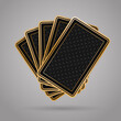 Five closed poker playing cards on grey background. Black and golden back side design
