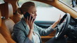 © stockbusters - Side view of businesswoman talking phone at car. Woman leaning on steering wheel