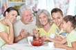 © aletia2011 - Close-up portrait of big happy family eating