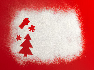 Wall Mural - Christmas tree on flour background. White flour looks like snow. Top view