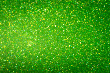 Glamor green sparkling background. Blured glitter background. Holiday abstract texture. Background of blue lights.