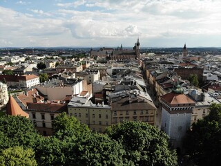 Wall Mural - Aerial photo from drone. The culture and historical capital of Poland. Comfortable and beautiful Krakow. The land of Legend. Old part of town,Main square, St. Mary's Basilica.