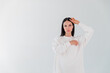 © fasli - Portrait beautiful adult sports girl model on white background. hoody. logo.