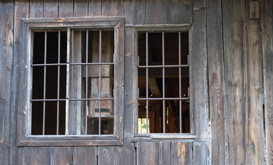 old plank wall and two windows