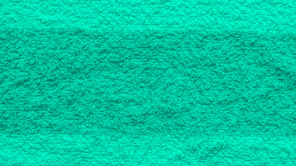 Turquoise beach towel texture close up - high resolution photo