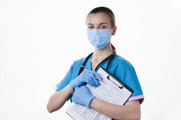 Girl doctor makes a medical examination on a white background