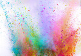 Fototapeta Krajobraz - Colored powder explosion on white background. Freeze motion.