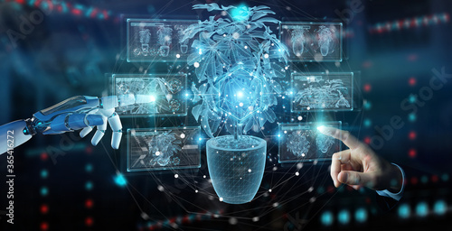 Cuadros en Lienzo Robot hand holding and touching holographic projection of a plant with digital a