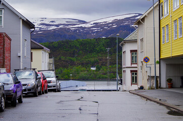 Breathtaking mountain range scenery and landscape with fjord around city of Alesund in Norway. A popular tourist and cruise ship destination in Scandinavia with Art Nouveau architecture and beauty