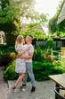 © andrey - beautiful and happy couple having fun in garden.