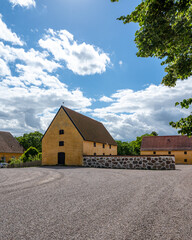 Wall Mural - An old traditional barn at the farm Börringekloster in the southern landscape Skåne in Sweden