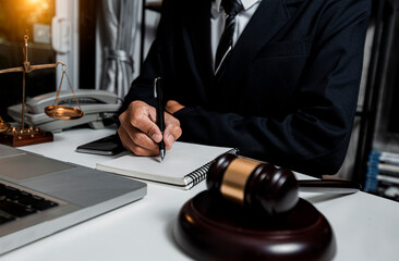 Wall Mural - Justice and law concept. Lawyer business man working with tablet at table office. 	