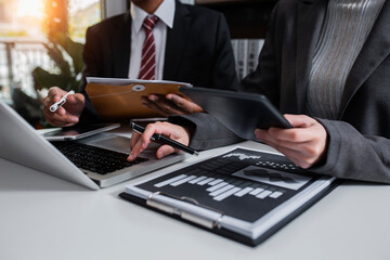 business concept, people working on tablet computer with digital data at meeting room office.