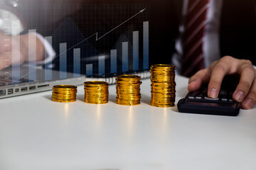 Businessman with coins stacked on each other in different positions. Money concept.