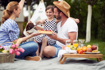 Wall Mural - Family enjoying summer together at backyard.