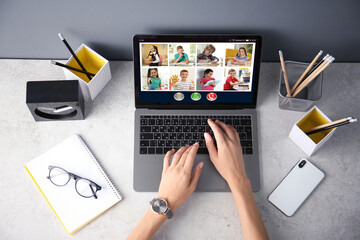 teacher giving online school lesson during quarantine and social distancing due to covid-19 pandemic