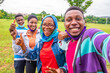 © Confidence - young black friends take a selfie together, feeling excited