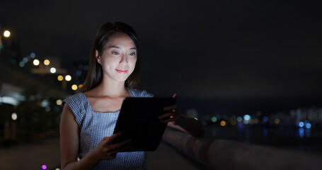 Sticker - Woman use of tablet computer at outdoor