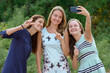 © Ranta Images - Three young beautiful women together at the park outdoors