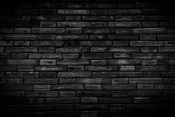  Black brick walls that are not plastered background and texture. The texture of the brick is black. Background of empty brick basement wall.