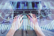 © peshkova - Double exposure of man's hands typing over computer keyboard and data theme hologram drawing. Top view. Technology concept.