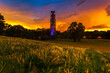 Naperville's Carillon rises above Rotary Hill at sunset just after a passing storm