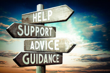 Wall Mural - Help, support, advice, guidance - wooden signpost, roadsign with four arrows