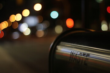 Wall Mural - waste bin and the night bokeh background