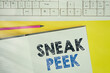 Word writing text Sneak Peek. Business photo showcasing to see before officially presented or released to the public Copy space on notebook above yellow background with keyboard on table