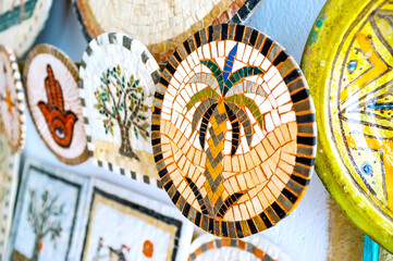 Sticker - The small mosaic plate with palm tree, handicraft stall of Sousse, Tunisia