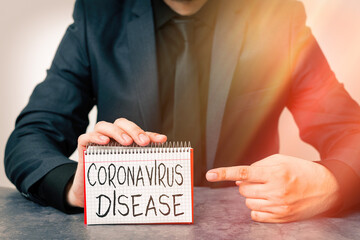 Writing note showing Coronavirus Disease. Business concept for defined as illness caused by a novel virus SARSCoV2 Model displaying different empty color notepad mock-up for writing idea