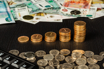 russian money coins and paper rubles lying on the table