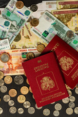 Wall Mural - inscription passport russian money coins and paper rubles lying on the table