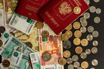 Wall Mural - inscription passport russian money coins and paper rubles lying on the table