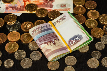 Wall Mural - russian money coins and paper rubles lying on the table