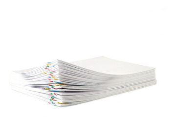 Colorful paper clip with pile of overload white paperwork isolated on white