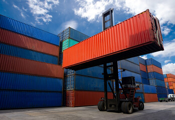 Wall Mural - Forklift truck handling container box in shipping industry