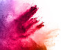 © kitsana - abstract powder splatted background. Colorful powder explosion on white background. Colored cloud. Colorful dust explode. Paint Holi.