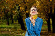 © HotPhotoPie - Beautiul woman in casual denim clothes in autumn scenery