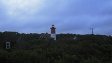 The Nauset Beach Lighthouse In Cape Cod Massachusetts. Shot In Time-Lapse During A Stormy Dusk. It Was Built In 1877 And Is In The National Register Of Historic Places.