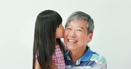 Wall Mural - granddaughter kiss grandfather