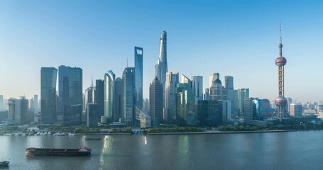 Fototapete - time lapse of the beautiful shanghai skyline in early morning, lujiazui financial center and huangpu river landscape, China.