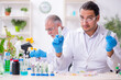 © Elnur - Two chemists working in the lab