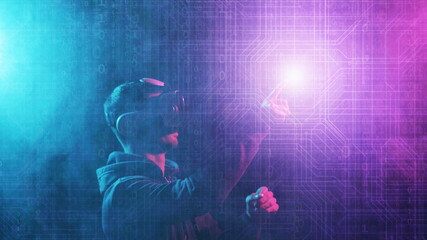 Wall Mural - Portrait of a man in virtual reality helmet over abstract digital background. Obscured dark face in VR goggles. Internet, darknet, gaming and cyber simulation.